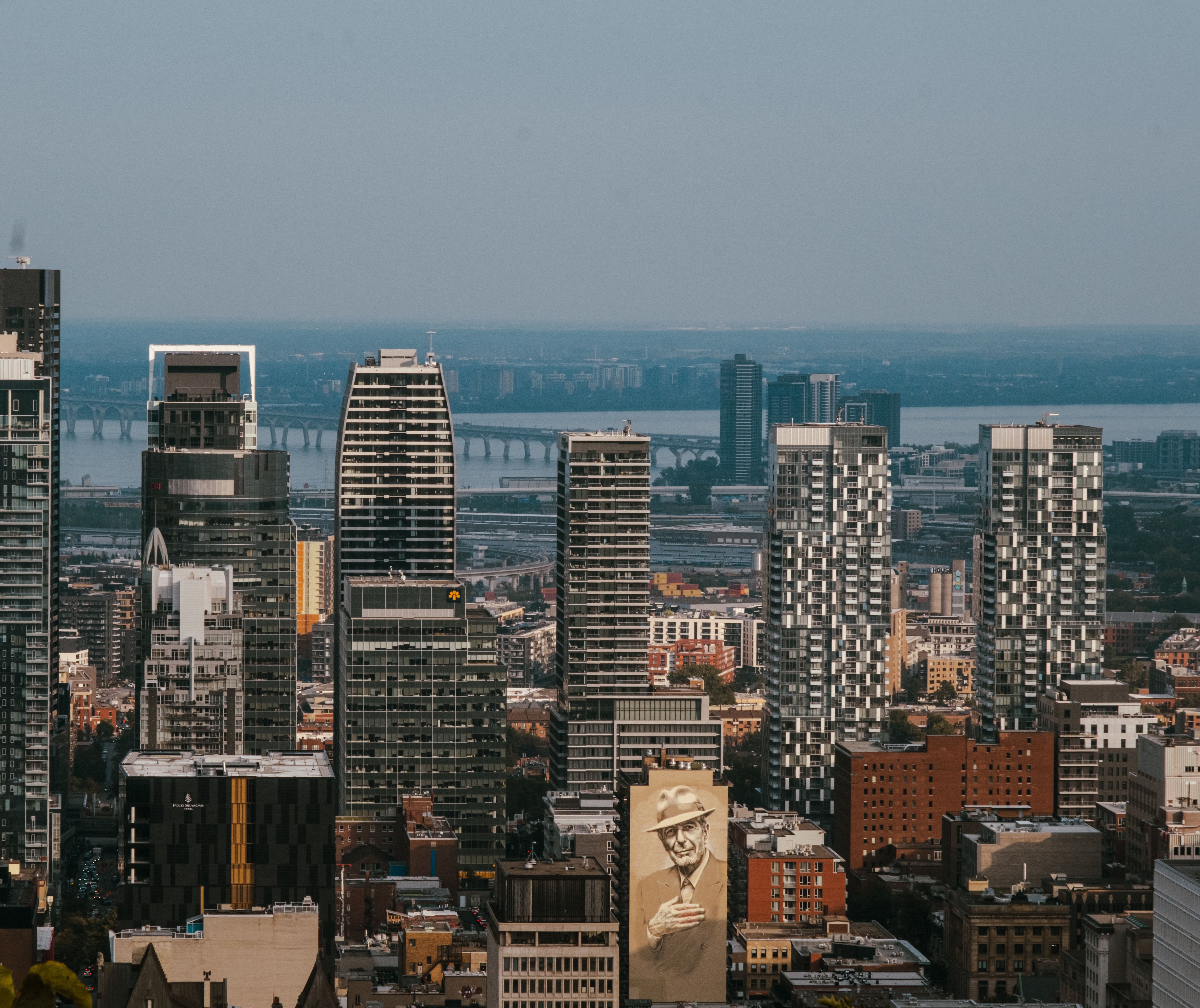 Illustration of the Montreal skyline, half hazy and half clean and bright
